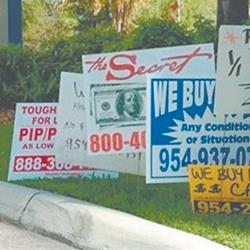 Enforcement of Temporary Sign Rules Helps Clear the Visual Clutter